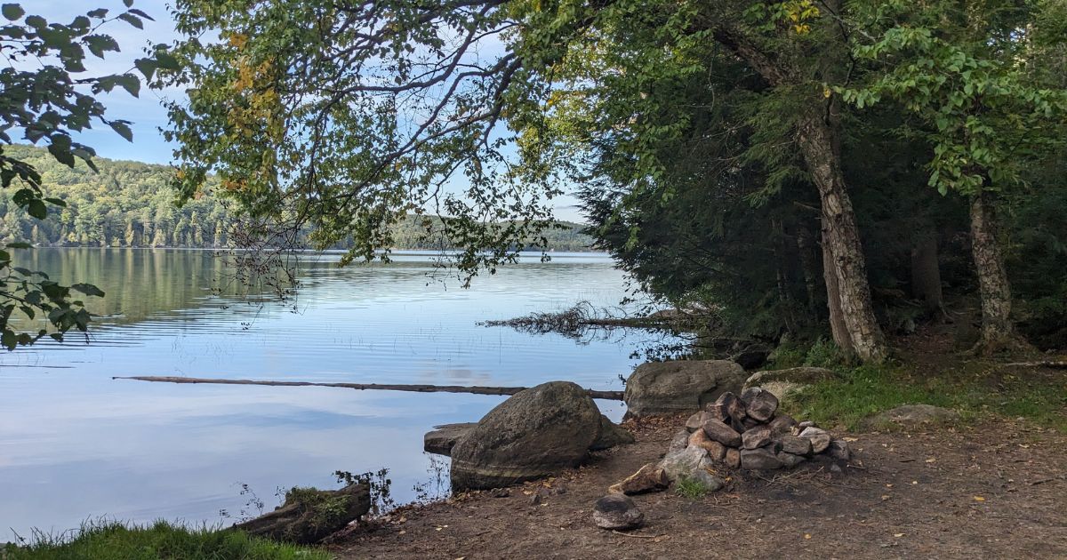 stone firepit next to lake | Haliburton Forest & Wildlife Reserve: Video Review